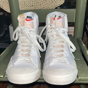 Nike White High-Top Sneakers with Red Accents